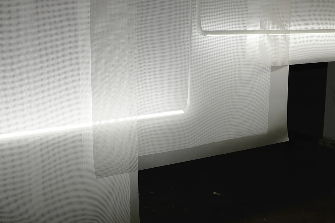 Visual for this record: Gauze becomes a screen only when the light behind it changes