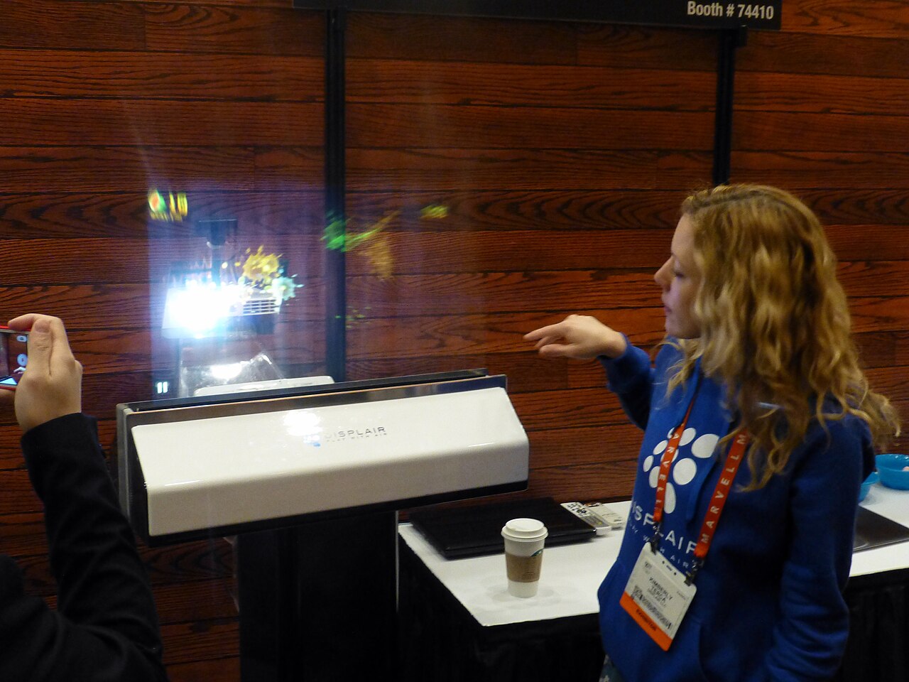A visitor interacting with the Displair fog display at CES 2013.